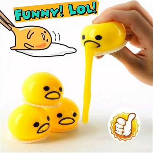 squishy puking egg yolk stress ball with yellow goop